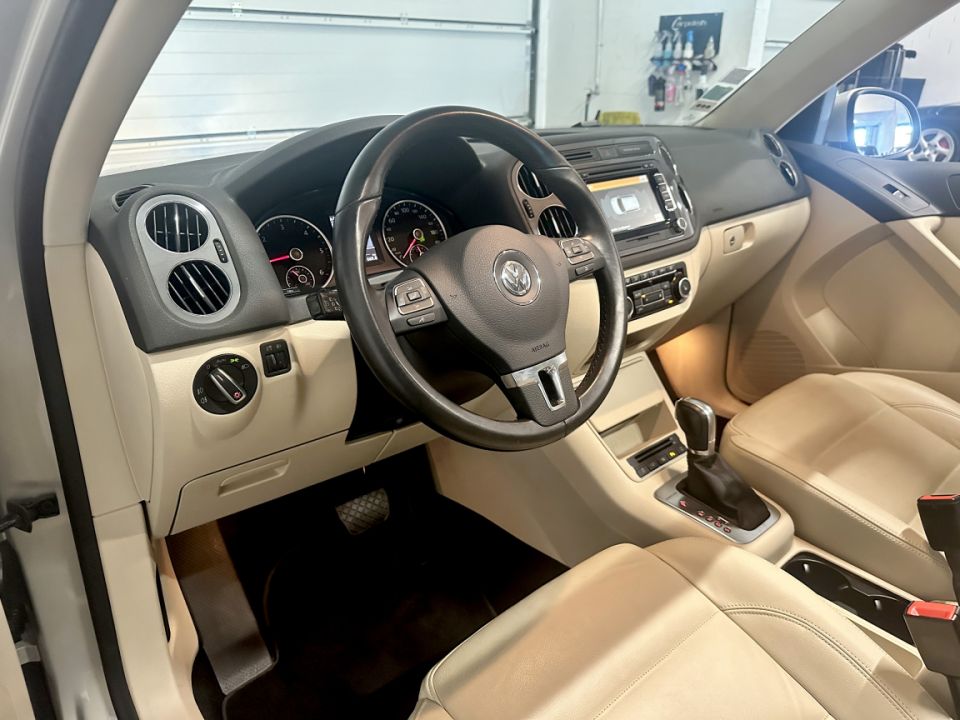 VOLKSWAGEN TIGUAN 2.0 TDI 140ch FAP CARAT 4MOTION DSG7 - SUV haut de gamme - image 1