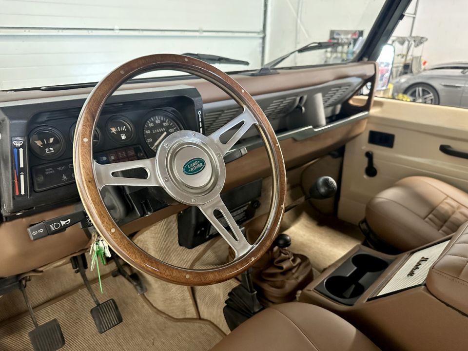 LAND ROVER DEFENDER 110 2.5 TD 85ch BVM5 Station Wagon 9 places Soft Top - État exceptionnel - 44 990 € - image 1
